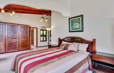 Ojochal Ocean View Estate Home with Guest Bungalow, Caretaker Home, Fruit Trees, and Waterfall
