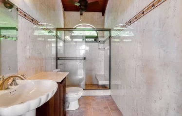 Ojochal Ocean View Estate Home with Guest Bungalow, Caretaker Home, Fruit Trees, and Waterfall