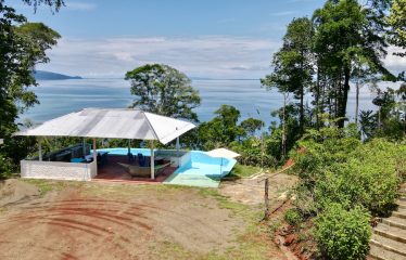 SPECTACULAR BEACHFRONT PROPERTY WITH 3 HOUSES ON 71 ACRES