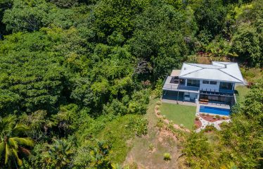 HOME WITH OCEAN VIEW AND CREEK ACCESS – 1.77 ACRES