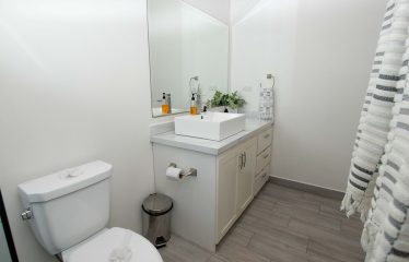 HOME WITH OCEAN VIEW AND CREEK ACCESS – 1.77 ACRES