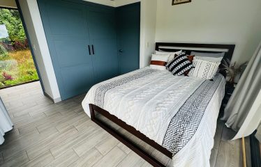 HOME WITH OCEAN VIEW AND CREEK ACCESS – 1.77 ACRES