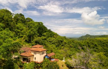 AMAZING OCEAN, JUNGLE AND WATERFALL VIEWS WITH THREE HOMES – 71 ACRES