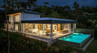 New contemporary tropical villa boasts with a movie theater and views of the iconic whale’s tail