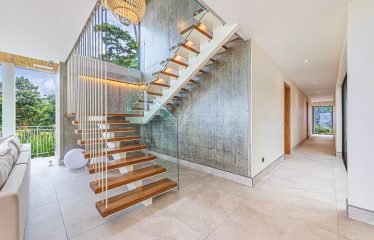 New contemporary tropical villa boasts with a movie theater and views of the iconic whale’s tail