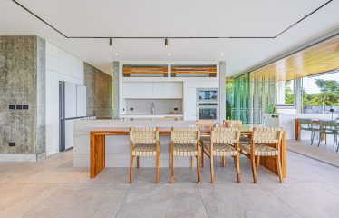 New contemporary tropical villa boasts with a movie theater and views of the iconic whale’s tail