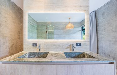 New contemporary tropical villa boasts with a movie theater and views of the iconic whale’s tail