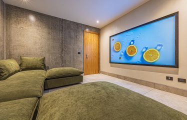 New contemporary tropical villa boasts with a movie theater and views of the iconic whale’s tail