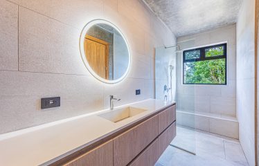 New contemporary tropical villa boasts with a movie theater and views of the iconic whale’s tail