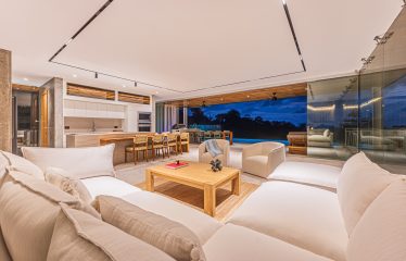 New contemporary tropical villa boasts with a movie theater and views of the iconic whale’s tail