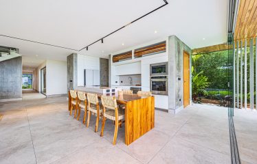 New contemporary tropical villa boasts with a movie theater and views of the iconic whale’s tail