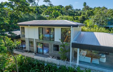 New contemporary tropical villa boasts with a movie theater and views of the iconic whale’s tail