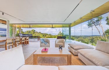 New contemporary tropical villa boasts with a movie theater and views of the iconic whale’s tail