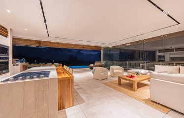 New contemporary tropical villa boasts with a movie theater and views of the iconic whale’s tail