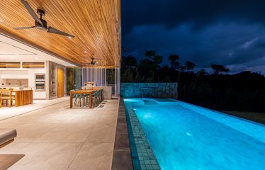 New contemporary tropical villa boasts with a movie theater and views of the iconic whale’s tail