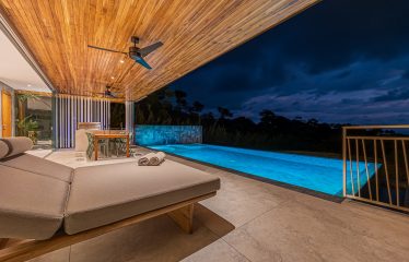 New contemporary tropical villa boasts with a movie theater and views of the iconic whale’s tail
