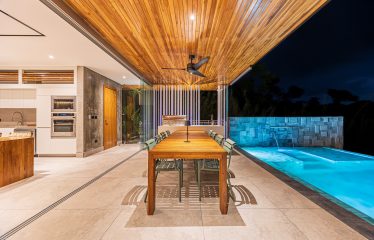 New contemporary tropical villa boasts with a movie theater and views of the iconic whale’s tail