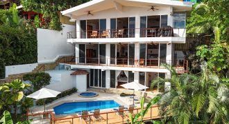LUXURY PROPERTY WITH FOUR BEDROOMS AND OCEAN VIEWS – 0.26 ACRES