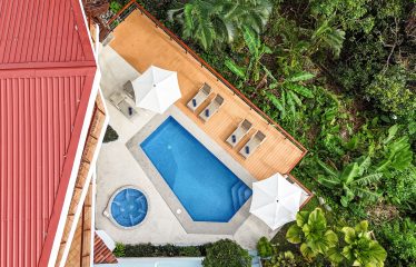 LUXURY PROPERTY WITH FOUR BEDROOMS AND OCEAN VIEWS – 0.26 ACRES