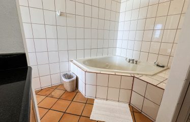 LUXURY PROPERTY WITH FOUR BEDROOMS AND OCEAN VIEWS – 0.26 ACRES