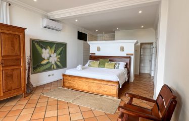 LUXURY PROPERTY WITH FOUR BEDROOMS AND OCEAN VIEWS – 0.26 ACRES