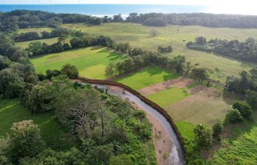 DEVELOPMENT PROPERTY WITH PUBLIC ROAD IN FRONT, IN HATILLO – 23 ACRES