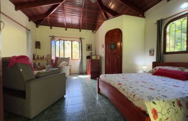 PROPERTY WITH TWO BEDROOM AND PEACEFUL GARDEN, IN OJOCHAL – 7.23 ACRES