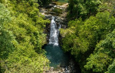 DEVELOPMENT PROPERTY WITH BEAUTIFUL CASCADE, IN UVITA – 101 ACRES