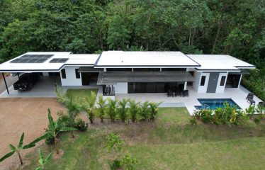 TROPICAL HOME WITH POOL AND SOLAR POWER IN PHASE 11 OF OJOCHAL – 1.41 ACRES