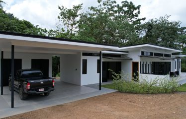 TROPICAL HOME WITH POOL AND SOLAR POWER IN PHASE 11 OF OJOCHAL – 1.41 ACRES