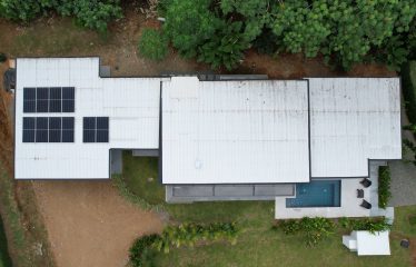 TROPICAL HOME WITH POOL AND SOLAR POWER IN PHASE 11 OF OJOCHAL – 1.41 ACRES