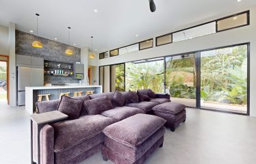 TROPICAL HOME WITH POOL AND SOLAR POWER IN PHASE 11 OF OJOCHAL – 1.41 ACRES