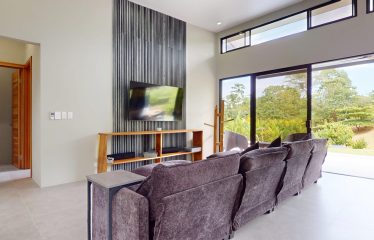 TROPICAL HOME WITH POOL AND SOLAR POWER IN PHASE 11 OF OJOCHAL – 1.41 ACRES