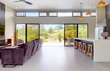 TROPICAL HOME WITH POOL AND SOLAR POWER IN PHASE 11 OF OJOCHAL – 1.41 ACRES