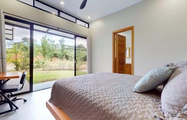 TROPICAL HOME WITH POOL AND SOLAR POWER IN PHASE 11 OF OJOCHAL – 1.41 ACRES