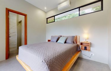 TROPICAL HOME WITH POOL AND SOLAR POWER IN PHASE 11 OF OJOCHAL – 1.41 ACRES
