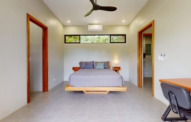 TROPICAL HOME WITH POOL AND SOLAR POWER IN PHASE 11 OF OJOCHAL – 1.41 ACRES