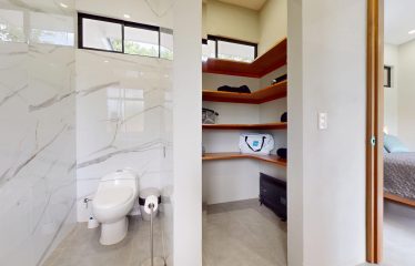 TROPICAL HOME WITH POOL AND SOLAR POWER IN PHASE 11 OF OJOCHAL – 1.41 ACRES