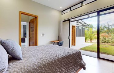 TROPICAL HOME WITH POOL AND SOLAR POWER IN PHASE 11 OF OJOCHAL – 1.41 ACRES