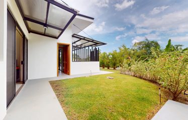 TROPICAL HOME WITH POOL AND SOLAR POWER IN PHASE 11 OF OJOCHAL – 1.41 ACRES
