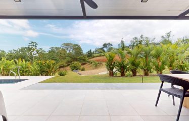 TROPICAL HOME WITH POOL AND SOLAR POWER IN PHASE 11 OF OJOCHAL – 1.41 ACRES