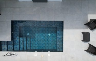 TROPICAL HOME WITH POOL AND SOLAR POWER IN PHASE 11 OF OJOCHAL – 1.41 ACRES