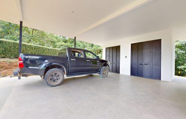 TROPICAL HOME WITH POOL AND SOLAR POWER IN PHASE 11 OF OJOCHAL – 1.41 ACRES