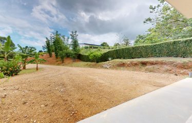 TROPICAL HOME WITH POOL AND SOLAR POWER IN PHASE 11 OF OJOCHAL – 1.41 ACRES